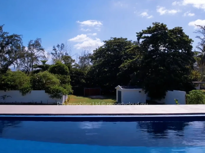 Experience coastal living at its finest with this house located just a stone's throw from the Poste Lafayette Beach. 