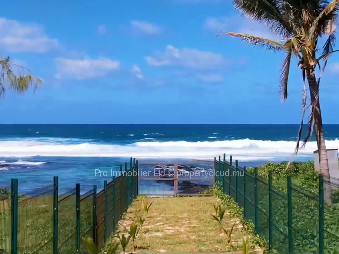 Experience coastal living at its finest with this house located just a stone's throw from the Poste Lafayette Beach. 